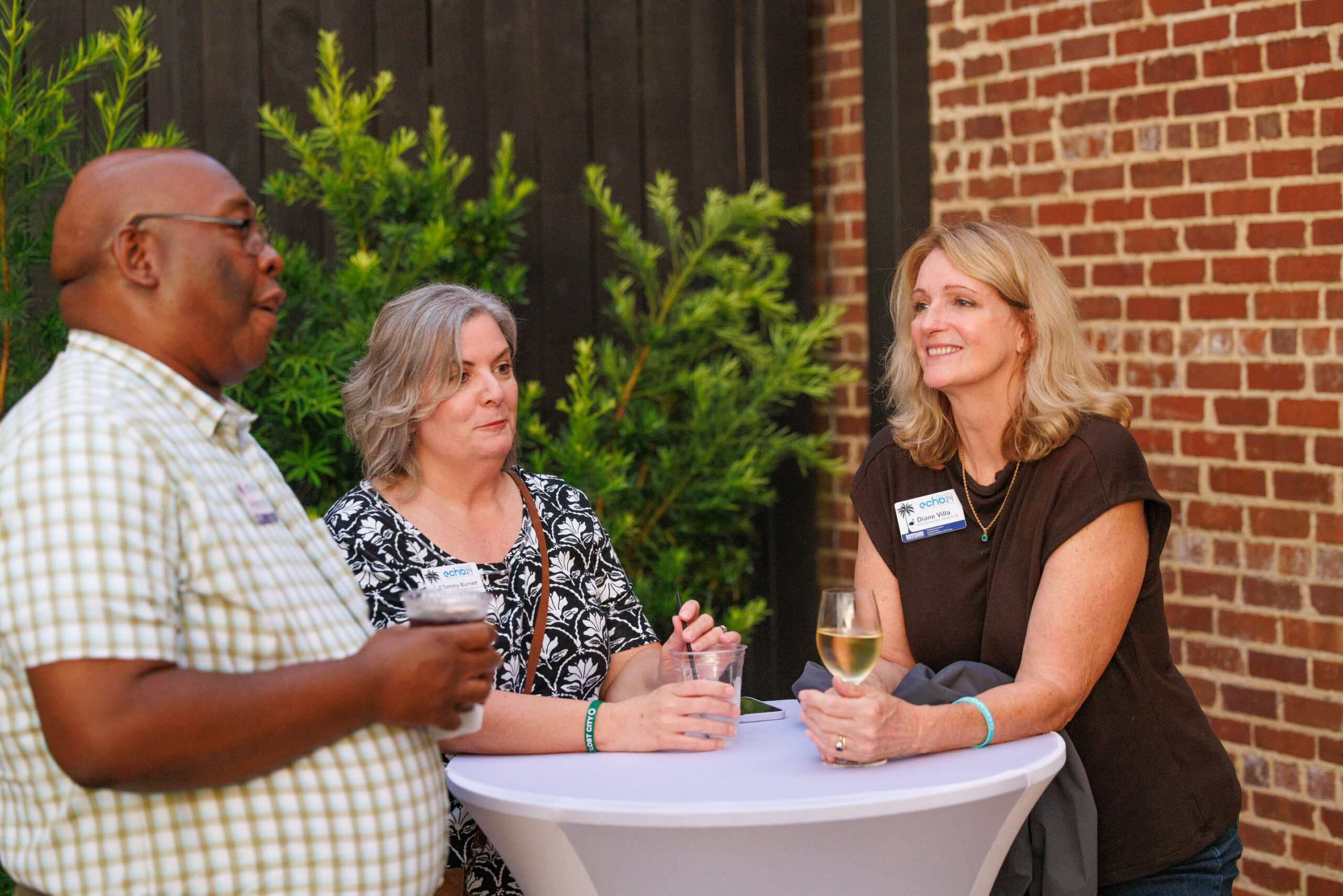 Echo 24 attendees talk during an evening at a local brewery.